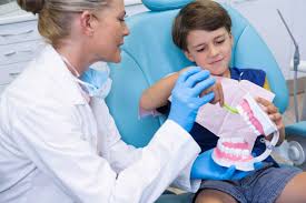 How often should we take kids to the dentist?