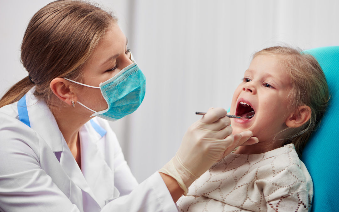 When should be the child's first visit to the dentist?